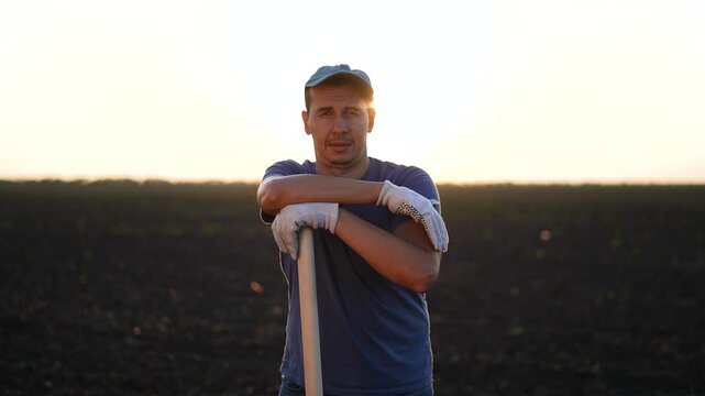 Agriculture. portrait of farmer in a field. farm agriculture happy concept. portrait of a farmer looking at camera. portrait lifestyle of a man looking at camera in a field.