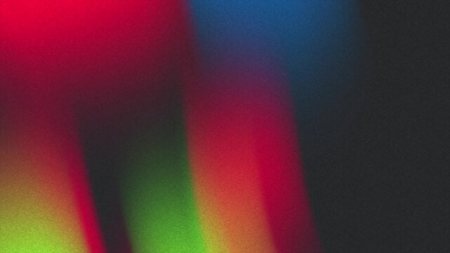 Abstract gradient background animation featuring vibrant red, green, blue, and black hues, creating a dynamic and energetic atmosphere.