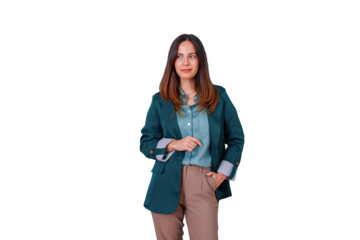 Professional woman standing confidently in a green blazer and smart casual outfit, looking forward with a slight smile