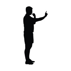Silhouette of a sports referee in uniform and cleats, blowing a whistle and using his finger to point a direction or issue a command. The image signifies fair play, enforcement, and decision-making.