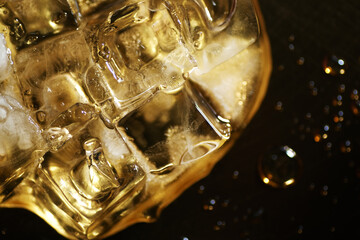 Top view of ice cube melting on flat surface