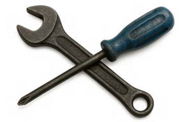 Wrench and screwdriver crossing, displaying repair tools for maintenance, construction, and handyman services
