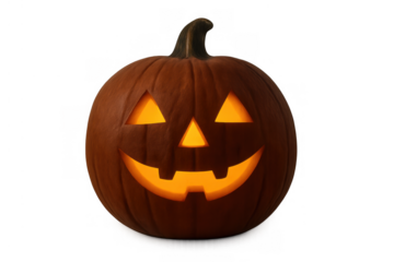 Carved pumpkin with a smiling face, radiating warm orange light, creating a spooky and fun atmosphere for holidays
