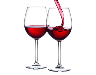 Pouring red beverage into wine glasses