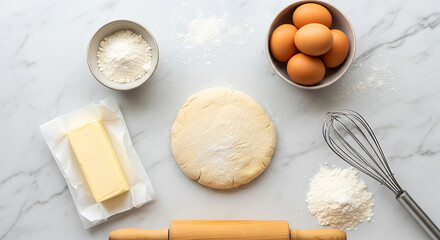 Dough rests on a marble surface, surrounded by ingredients like eggs, flour, and butter, with a rolling pin and whisk nearby.