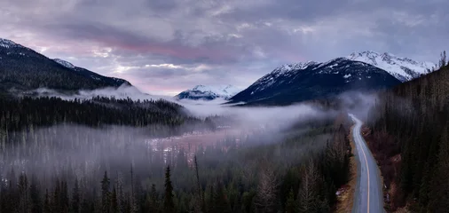 Keuken achterwand Lavendelkleur Misty Valley Road Through Snowy Mountain Range in BC, Canada at Sunset  © edb3_16