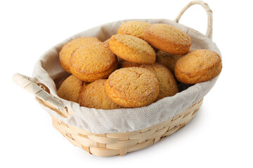 Wicker basket with sweet cookies on white background