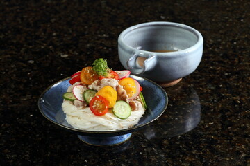 Rei Shabu is a cold dish consisting of thinly sliced ​​pork cooked in the shabu-shabu style. Rei Shabu is a cold version, meant to be eaten on hot days. This dish includes raw vegetables such as cucum