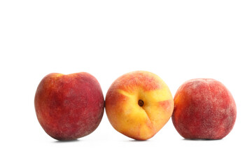 Sweet ripe peaches on white background