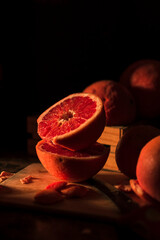 Grapefruit on black background