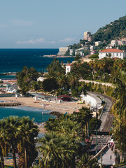 View of beach and coastline in Sanremo on a windy day 