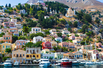 Symi town on Symi island with colorful neoclassical houses, Greece
