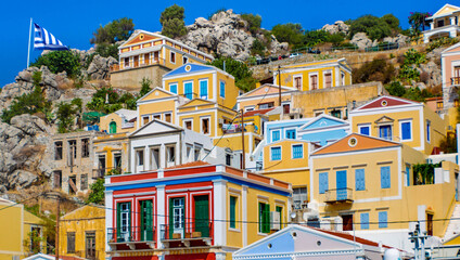 Symi town on Symi island with colorful neoclassical houses, Greece