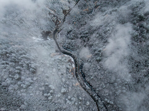 Misty Valley with Frosted Forest at Bipenggou - Powered by Adobe