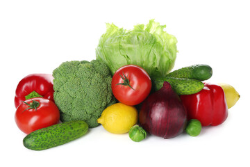 Pile of different fresh raw vegetables and lemon isolated on white