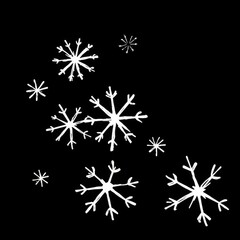 A pattern of white doodle snowflakes on a solid black background. This high-contrast winter design has a whimsical, festive look perfect for holiday and seasonal projects.