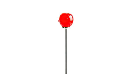 A single glossy red maraschino cherry with a shiny glaze is elegantly presented on a thin metal cocktail pick in a minimalist and dramatic composition
