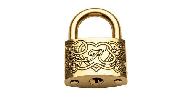 An elegant close-up of an ornate golden padlock featuring intricate engravings of intertwined monograms and heart shapes, symbolizing love and commitment - Powered by Adobe