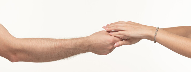 female and male hands touching each other