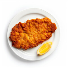 A perfectly golden brown, crispy breaded veal schnitzel served on a white plate with a fresh lemon wedge, isolated on white background
