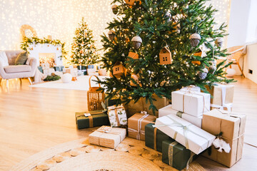 Christmas tree with gifts under it in a cozy home interior with festive lights, creating a warm atmosphere for holiday celebration, decoration.