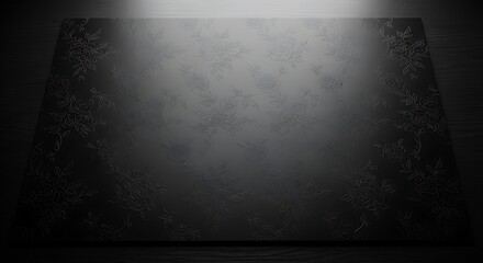 Embossed Floral Pattern on Dark Surface with Spotlight