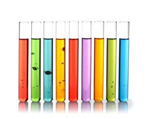Assortment of colorful liquids in laboratory glass tubes aligned perfectly