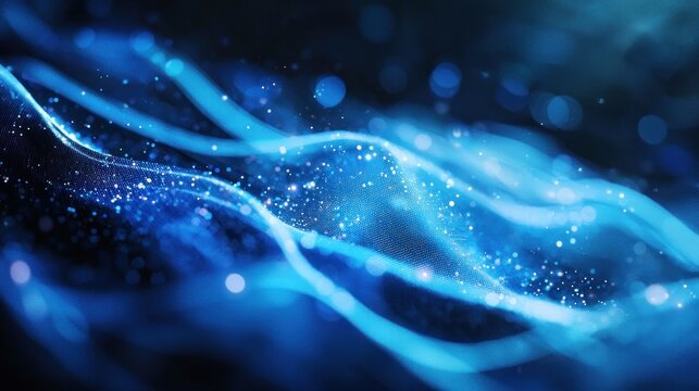 Blue and white abstract wave pattern with glowing particles and light effects.
