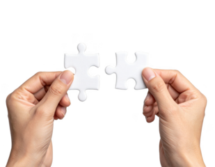 Hands connecting two white jigsaw puzzle pieces for a teamwork solution isolated on white and transparent background