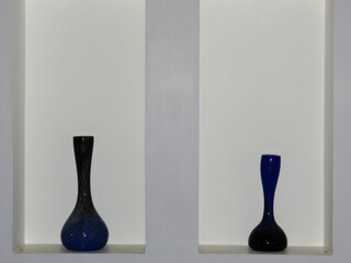 Bright sunset over mountain range and city, shimmering water