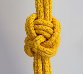 Strong Yellow Rope Tied in Knot
