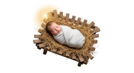 A baby swaddled in a blanket, lying in a wooden manger with hay and a light shining above.