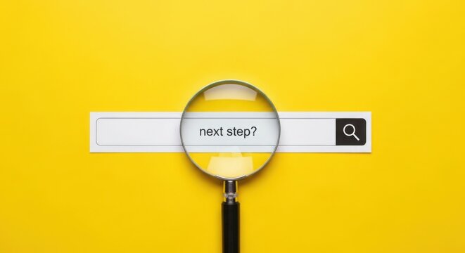 Searching for next step with magnifying glass over a search bar on yellow background