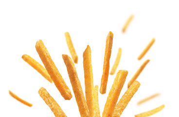 French fries levitate on a white background