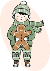 Boy in Winter Clothes Holding Gingerbread Man Cookie.
