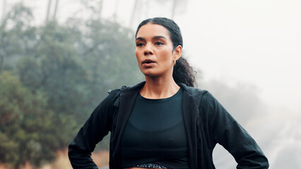 Tired, outdoor and woman with fitness, training and breathing with wellness, morning and break. Person, runner or healthy athlete with exercise, exhausted and hobby with fatigue, resting or challenge