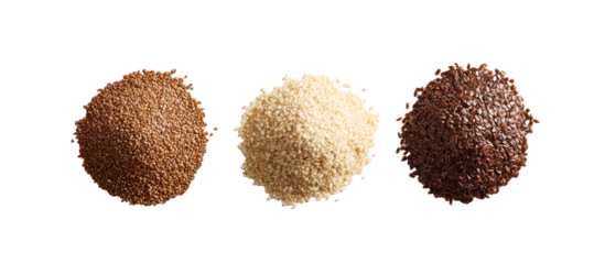 Three piles of flax sesame sunflower seeds side by side overhead on transparent background