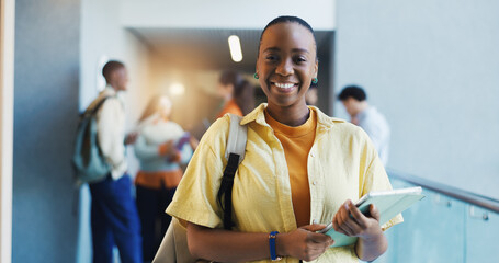 College, portrait or woman in hallway with tablet, knowledge or scholarship in study opportunity. Happy, tech or student in university with confidence, education and pride in academic funding.