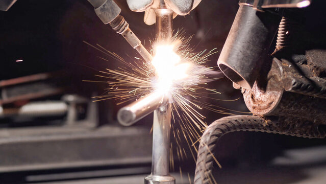 MIG TIG welding process on steel parts for heavy machinery repair