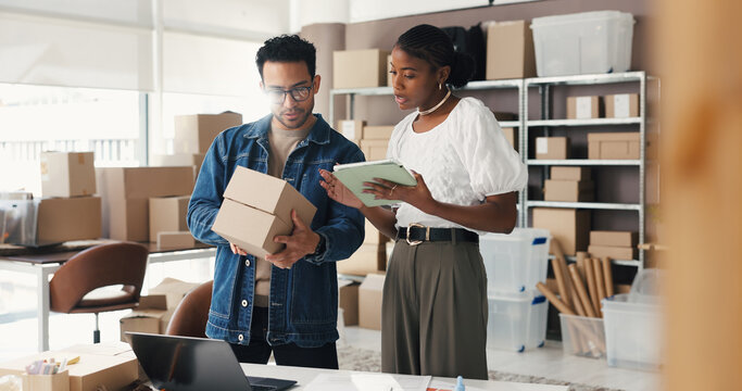 Talking, boxes and people on tablet for supply chain, online orders and shipping website in office. Small business, team and man with woman on tech for logistics, delivery schedule and distribution