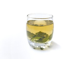Cat's whiskers leaf boiled water (Orthosiphon aristatus) in glass on white background. Herbal drink for health  