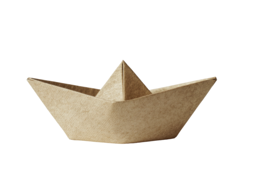 Paper boat; tan color; isolated against dark background