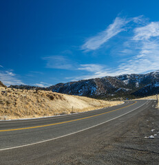 Road Across Valley Floor in Mountains