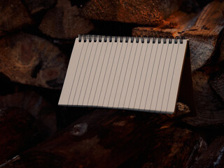 Warm rustic background with stacked firewood and spiral notebook placed near center, lined pages with blank space, soft firelight glow, cozy creative composition, autumn atmosphere.