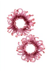 Two vibrant, translucent red onion rings, meticulously curled and arranged in circular formations, float against a stark white backdrop