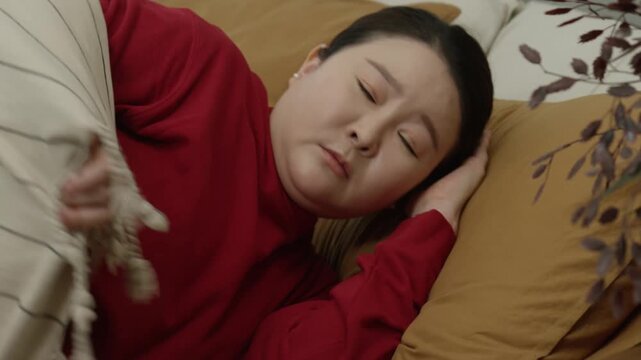 Stressed Woman eventually Hiding Under Blanket &ndash; Anxiety, Overwhelm, and Emotional Fatigue Concept