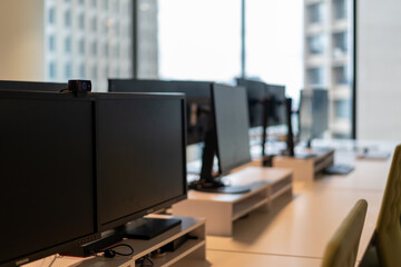 Modern office interior with sleek desks natural light inspiring productivity collaboration
