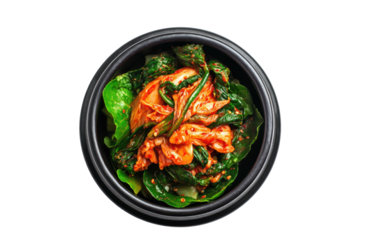 Kimchi in dark bowl fermented cabbage, chili, leafy greens