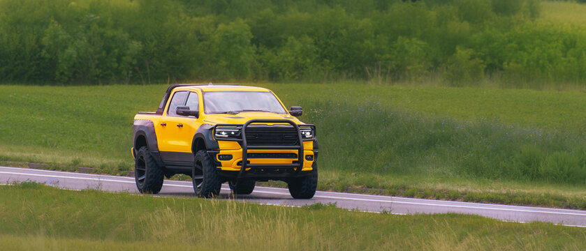 Powerful 4wd pickup with bull bar in open land