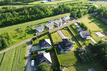 Summer landscape of green countryside homes
